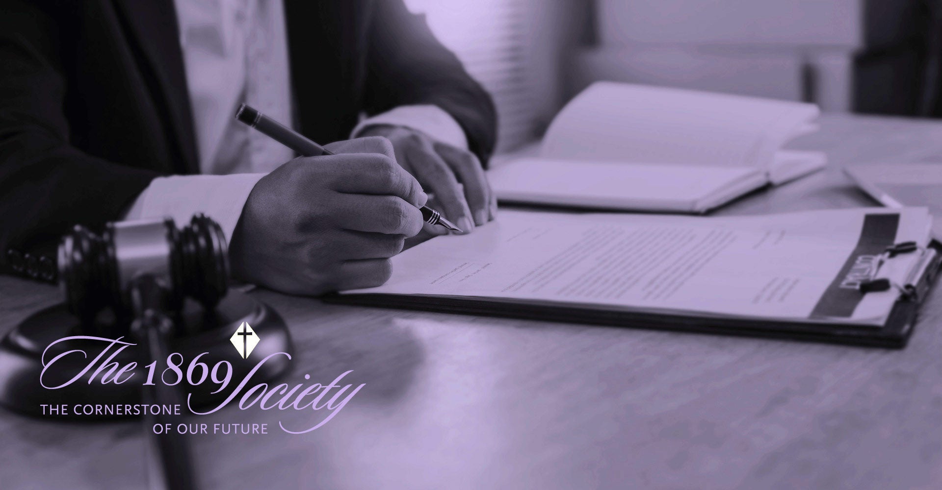 Image of a person filling out forms.