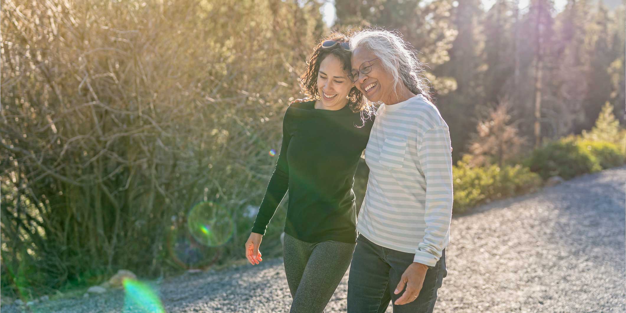 Image of two women walking.